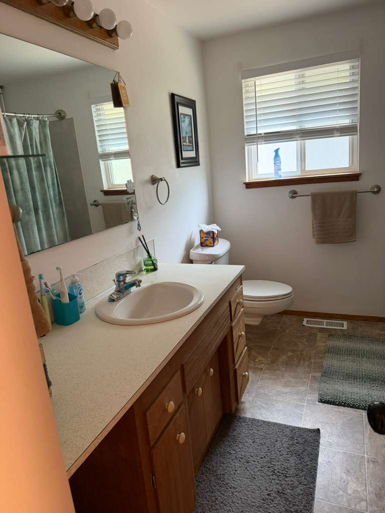 Clean bathroom vanity with streak-free mirror